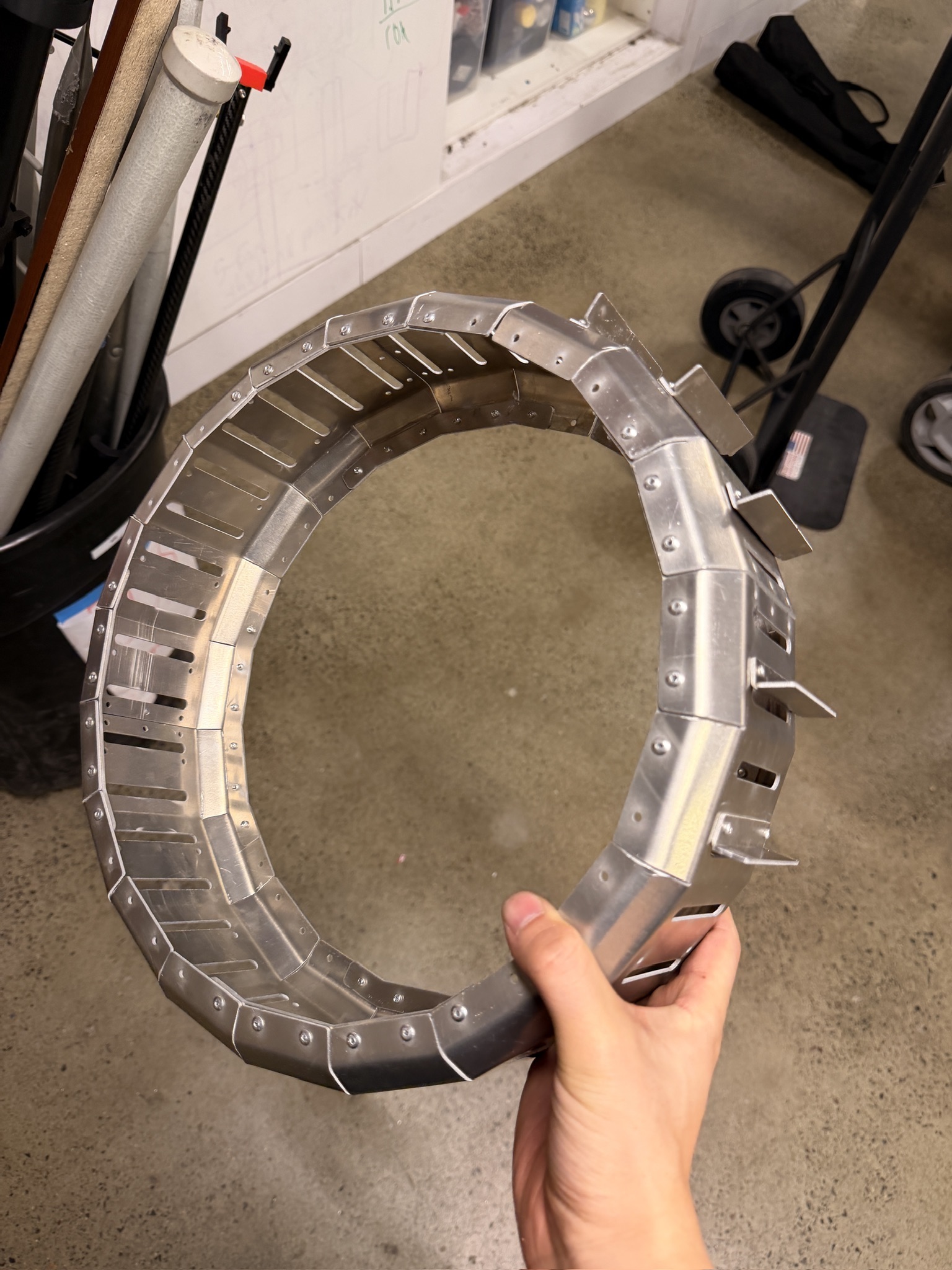 Fabricated aluminum wheel rim before installation of the central support